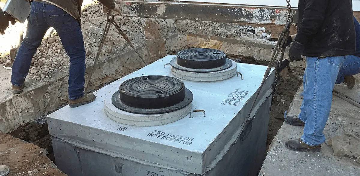 Grease trap installation for a commercial property drainage system in Jackson, MS